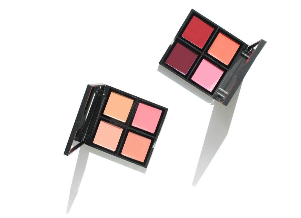 Flatlay of Lipstick and Cream Blush Palettes for use as cosmetics and makeup