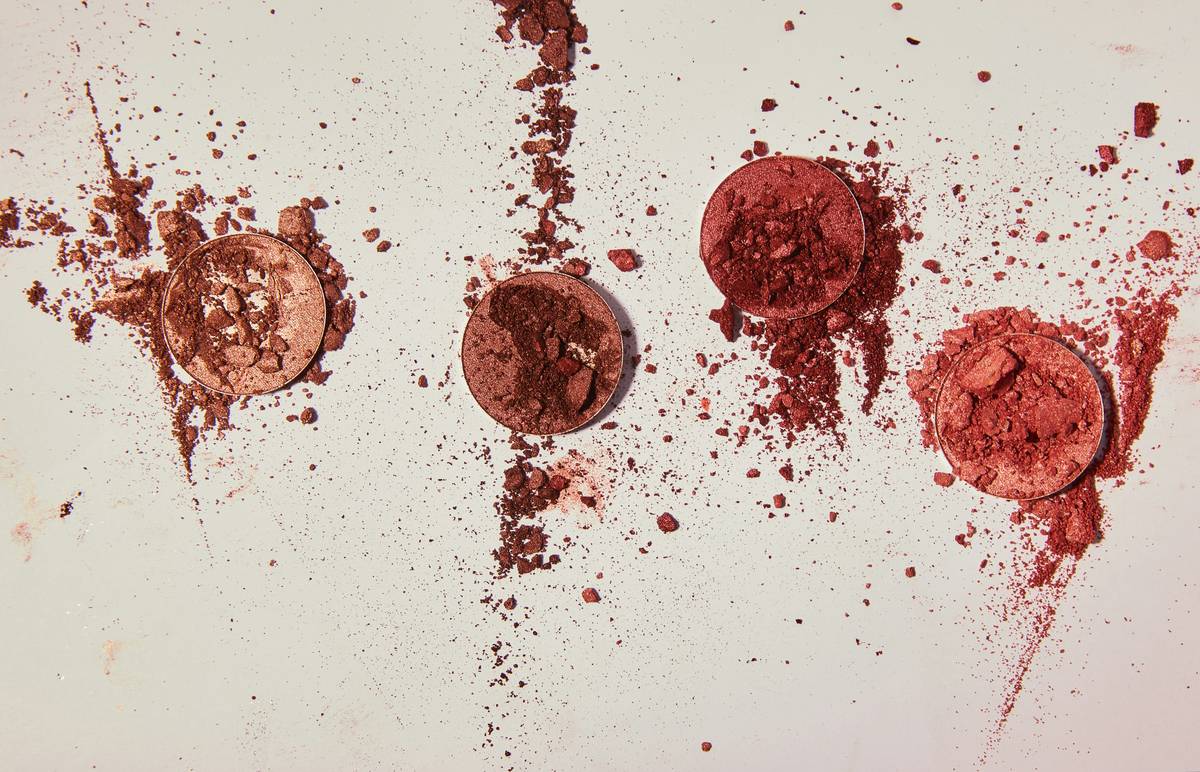 Side-by-side comparison of safe makeup to use vs conventional makeup ingredient labels